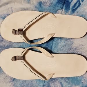 White rainbow flip flops